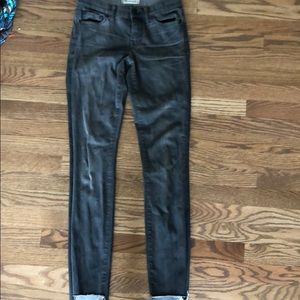 Madewell step hem grey skinny jeans.